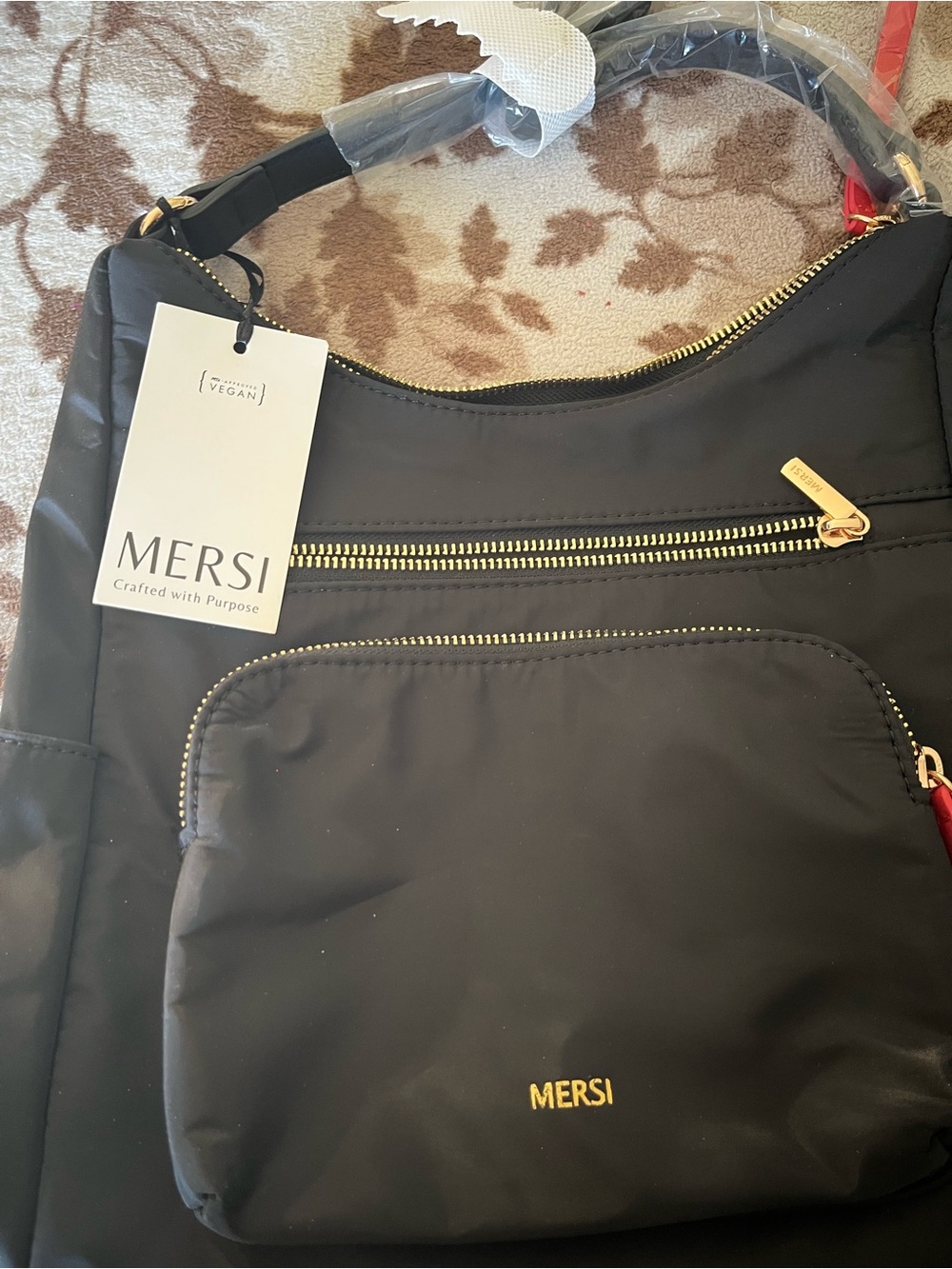 MERSI Black Shoulder Bag with Gold Hardware and Front Pocket